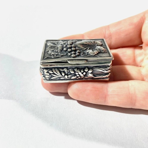 Old silver-plated pill box with embossed decoration like new