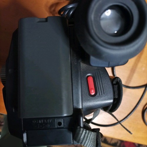 Hitachi video camera used with foldable screen and VHS cassette