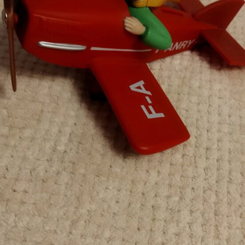 Le Petit Prince figure decorative like new with red airplane