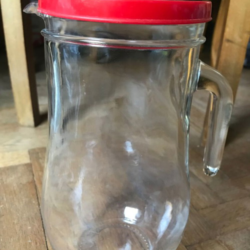 Glass jug with plastic lid used, retro style