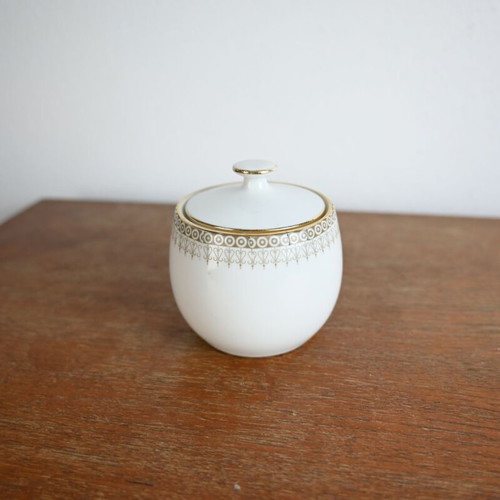 Vintage porcelain sugar bowl with lid used, gold trim