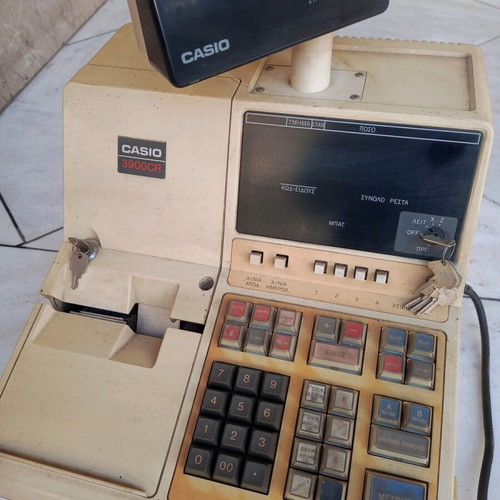 Vintage cash register used for decor without drawer