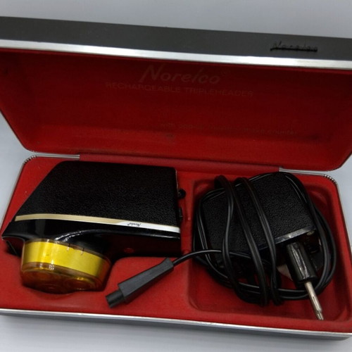 Vintage Norelco electric shaver with case used