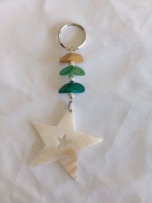 Star keychain with green stones