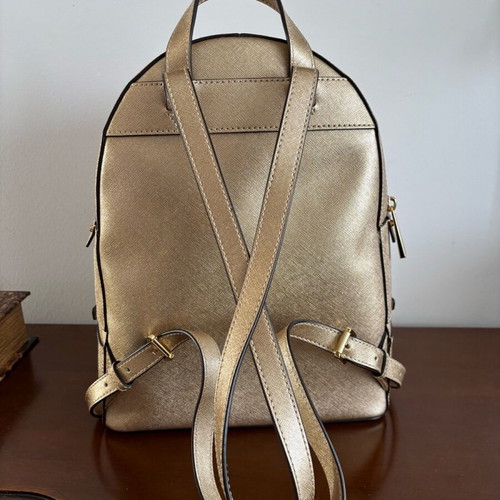 Michael Kors Rhea Medium backpack like new, gold