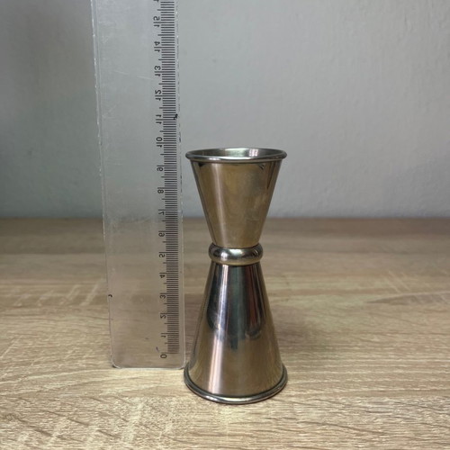 Cocktail shaker and jigger used, stainless steel