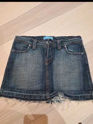 Denim skirt with rhinestone design on back