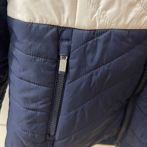 Tommy Hilfiger women’s puffer jacket used, size medium, colorblock design