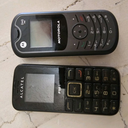 Motorola and Alcatel cell phones used, set of 2