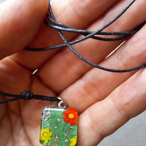 Necklace pendant with green floral design