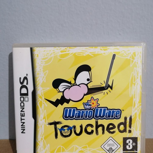 Wario Ware Touched empty case with manuals for Nintendo DS