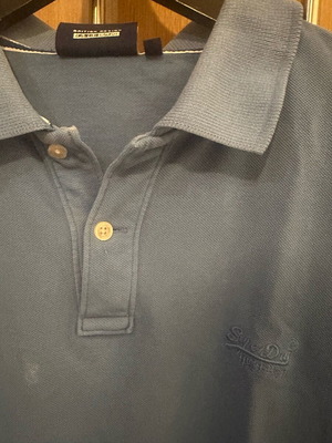 Superdry Polo shirt size XL like new, sea blue with small white defect