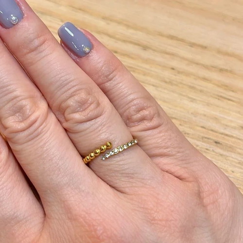 Steel ring with adjustable size new, gold tone