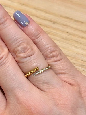 Steel ring with adjustable size new, gold tone