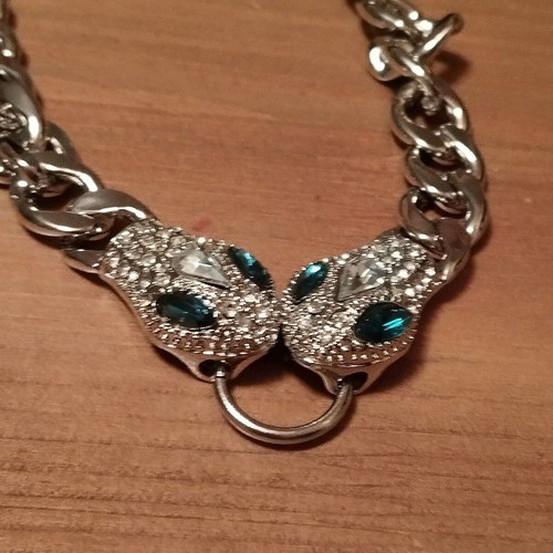 Choker necklace solid with snakes in like new condition