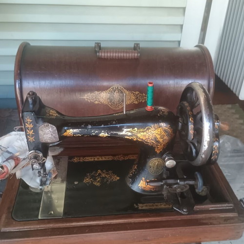 Singer portable sewing machine used, collectible