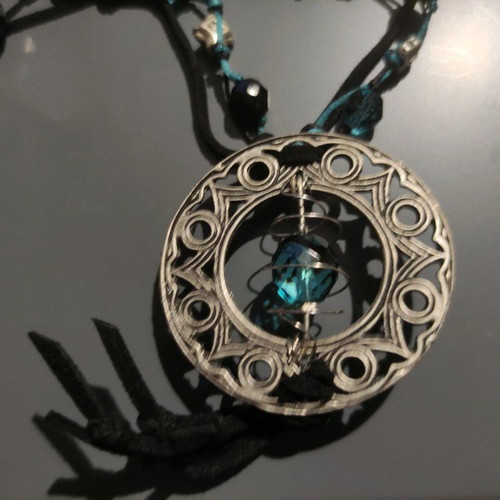 Boho pendant necklace new with metallic details and black blue beads