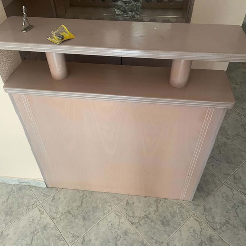 Mini bar like new with mirrors, cabinets, and carpeted floor