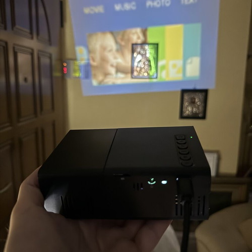 Mini projector like new with remote control