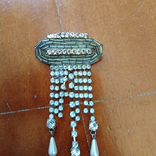 Brooch with stones like new, gray