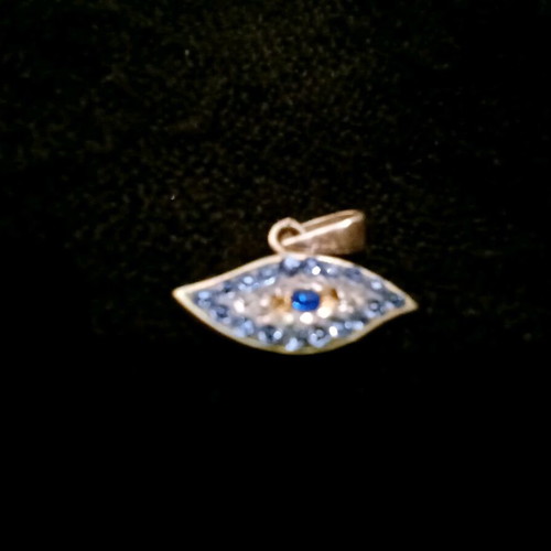 Silver evil eye pendant like new, turquoise and silver