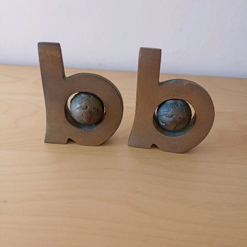 Set of two used bronze decorative items with globe