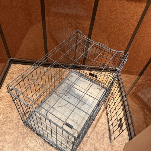 Metal Pet Crate used, durable for medium-sized dogs
