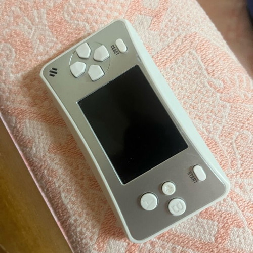 Retro handheld electronic game like new, 4 game types
