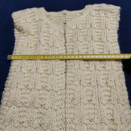 Sleeveless knitted vest used with pattern yellow pale