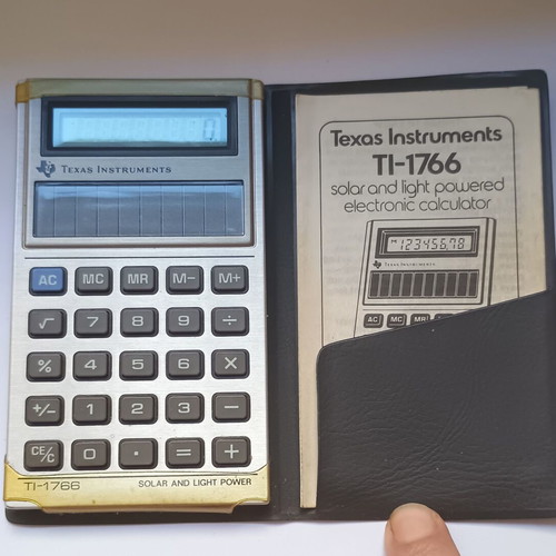 Texas Instruments TI-1766 solar calculator 1981 like new