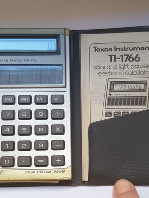 Texas Instruments TI-1766 solar calculator 1981 like new