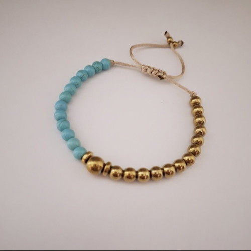 Bracelet with turquoise and gold beads, adjustable cord