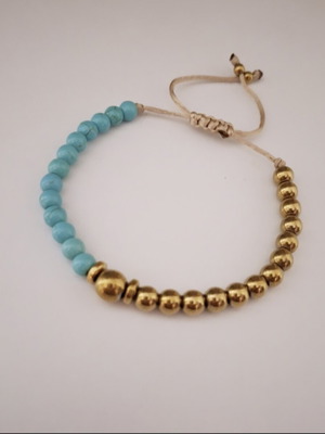 Bracelet with turquoise and gold beads, adjustable cord