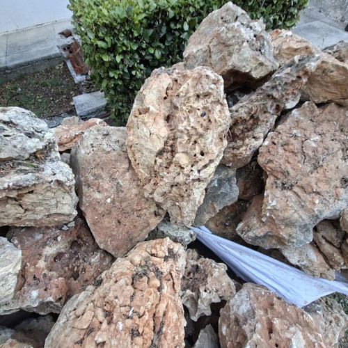 Decorative stones with holes used for waterfalls and rock gardens
