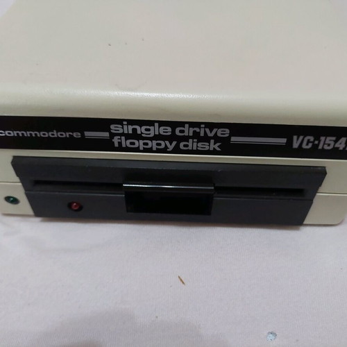 Commodore 1541 drive like new with 2 floppy disks