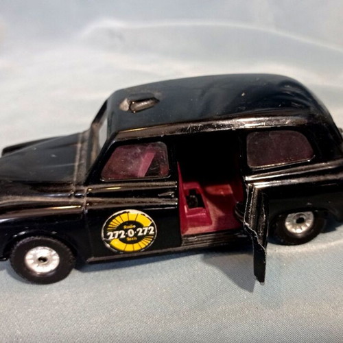 Corgi Austin London Taxi diecast model with opening doors like new