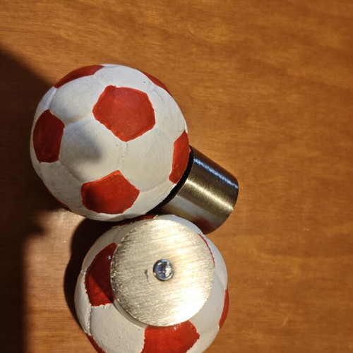 Football curtain rod finials, pair, red and white