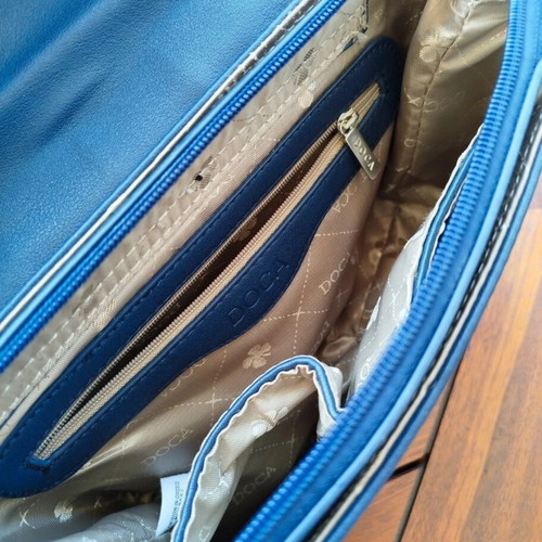 Doca women's crossbody bag like new, beige and blue