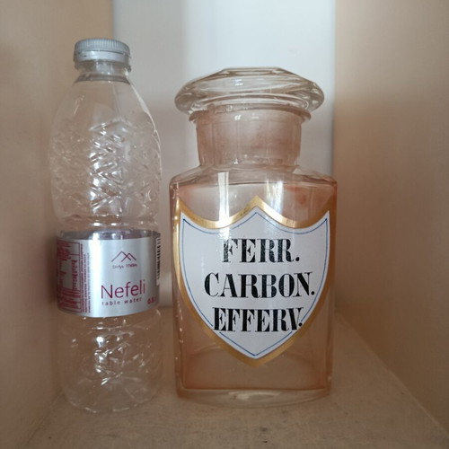 Old pharmacy bottle used with handmade label