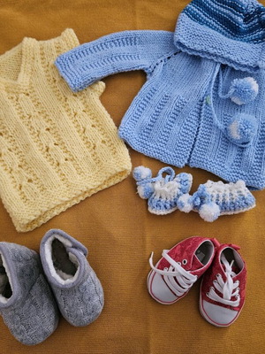 Baby clothes and handmade booties like new