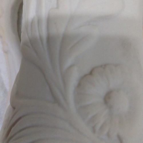 Small ceramic vase like new with embossed flower