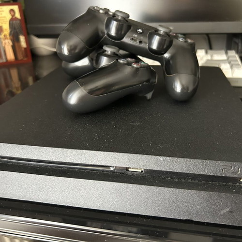 PlayStation 4 Slim 1TB like new with 2 controllers and 6 games