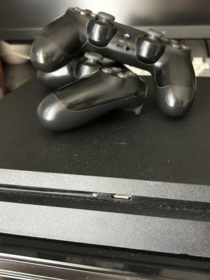 PlayStation 4 Slim 1TB like new with 2 controllers and 6 games