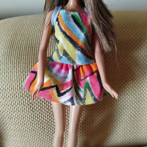 Barbie Fashionistas doll like new with colorful geometric dress and orange boots