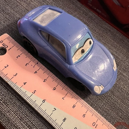 Mattel Disney Pixar Cars Sally 10cm toy car preowned with turning mechanism