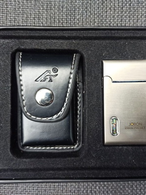 Gas lighter new with synthetic leather case