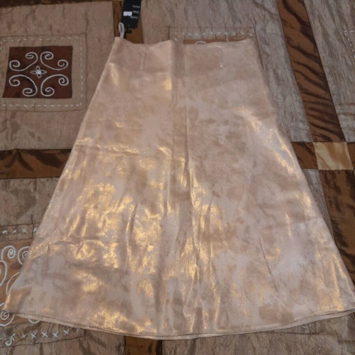 Skirt new gold color, size S