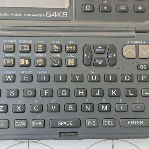 Sharp ZQ-3250 electronic organizer used, defective
