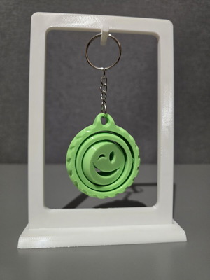 3D printed rotating wink emoji keychain spinner like new