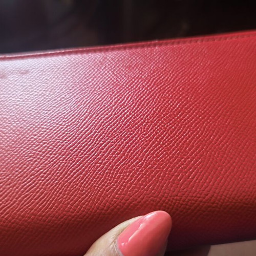 Juicy Couture red wallet used with side wear on gold details